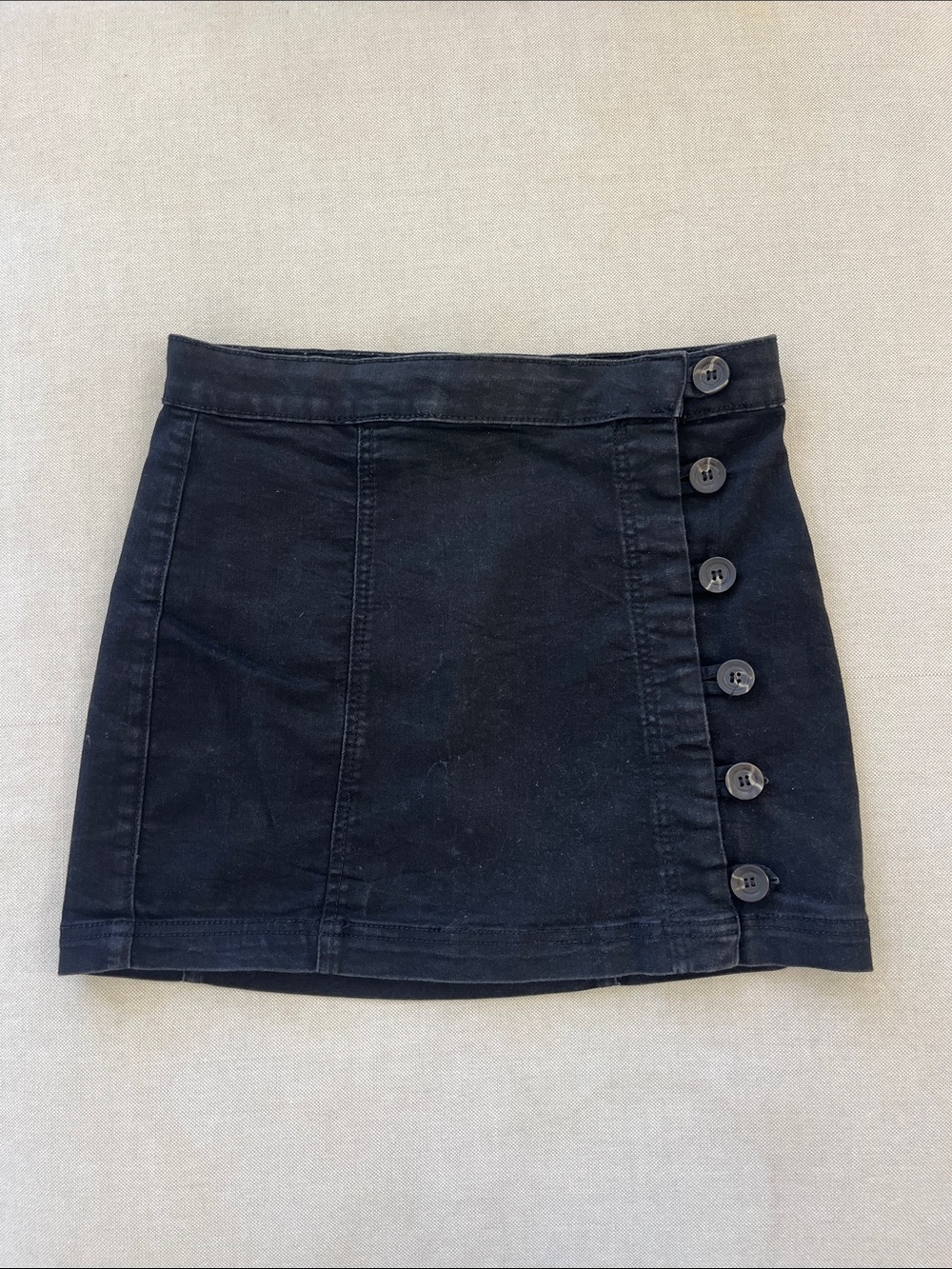 Black Denim Stretchy Skirt with side buttons.
